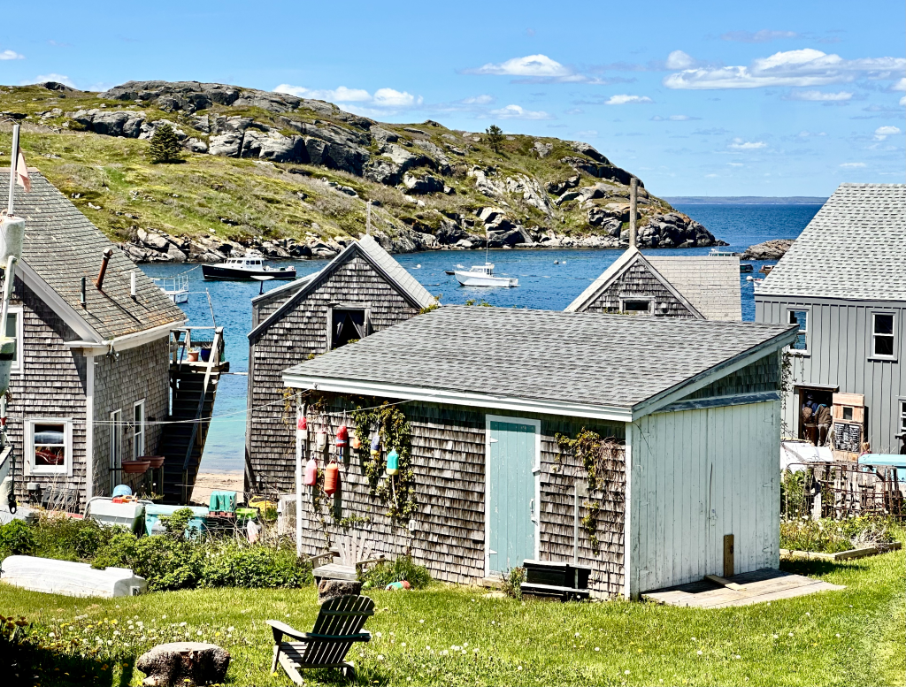 Historic fishing village on Monhegan Island, Maine, with weathered cottages by the sea.