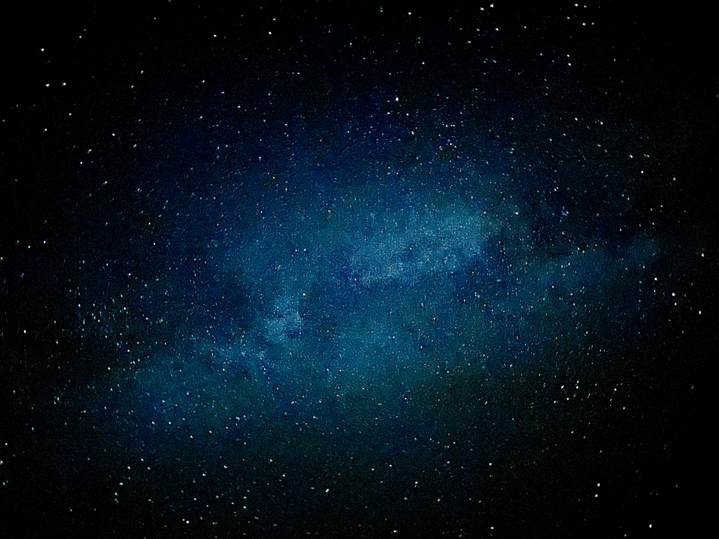 Milky Way arching across the horizon, filled with countless stars.